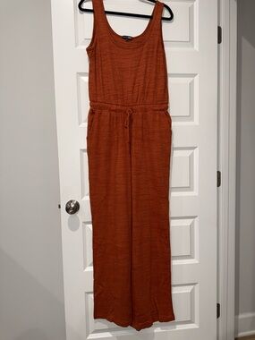 Fashion Nova Sleeveless Ribbed Jumpsuit in Rust Orange